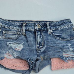 American Eagle shorts with pink lace pockets